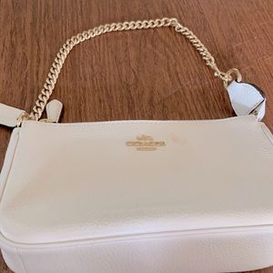 never used cream colored beautiful coach bag!